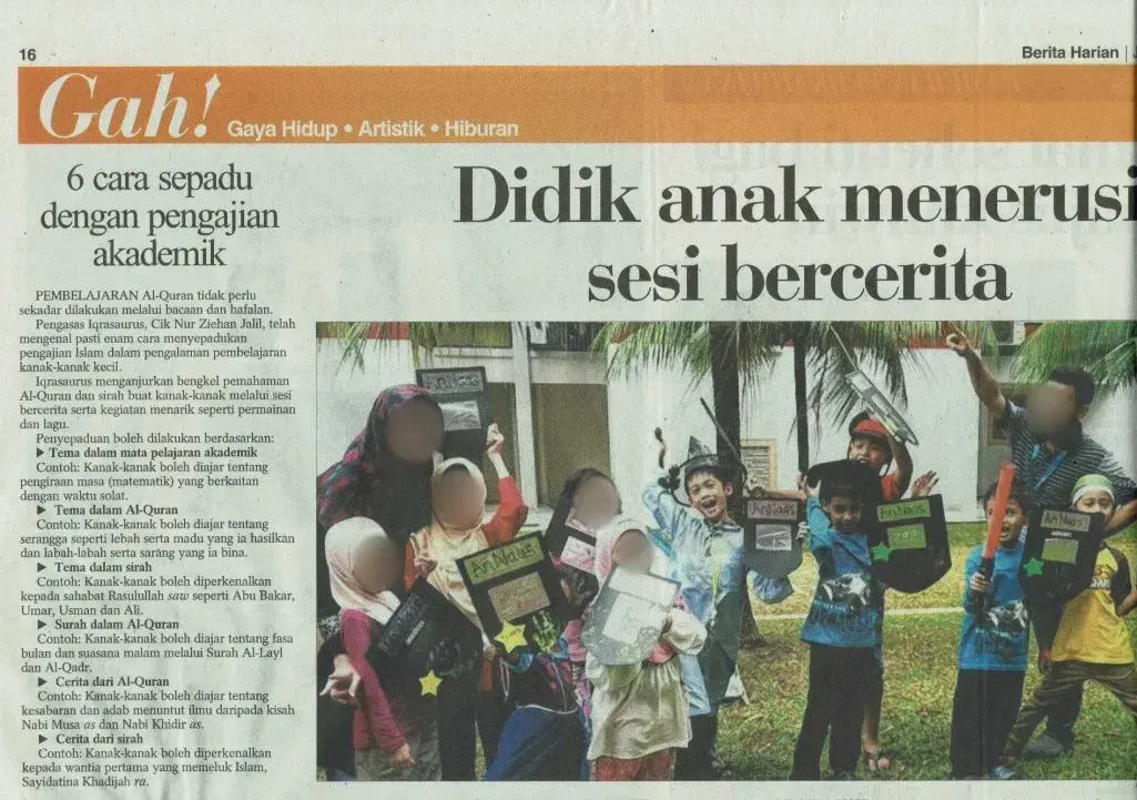 The Berita Harian feature, with its headline and a photo of children holding An-Naas shields