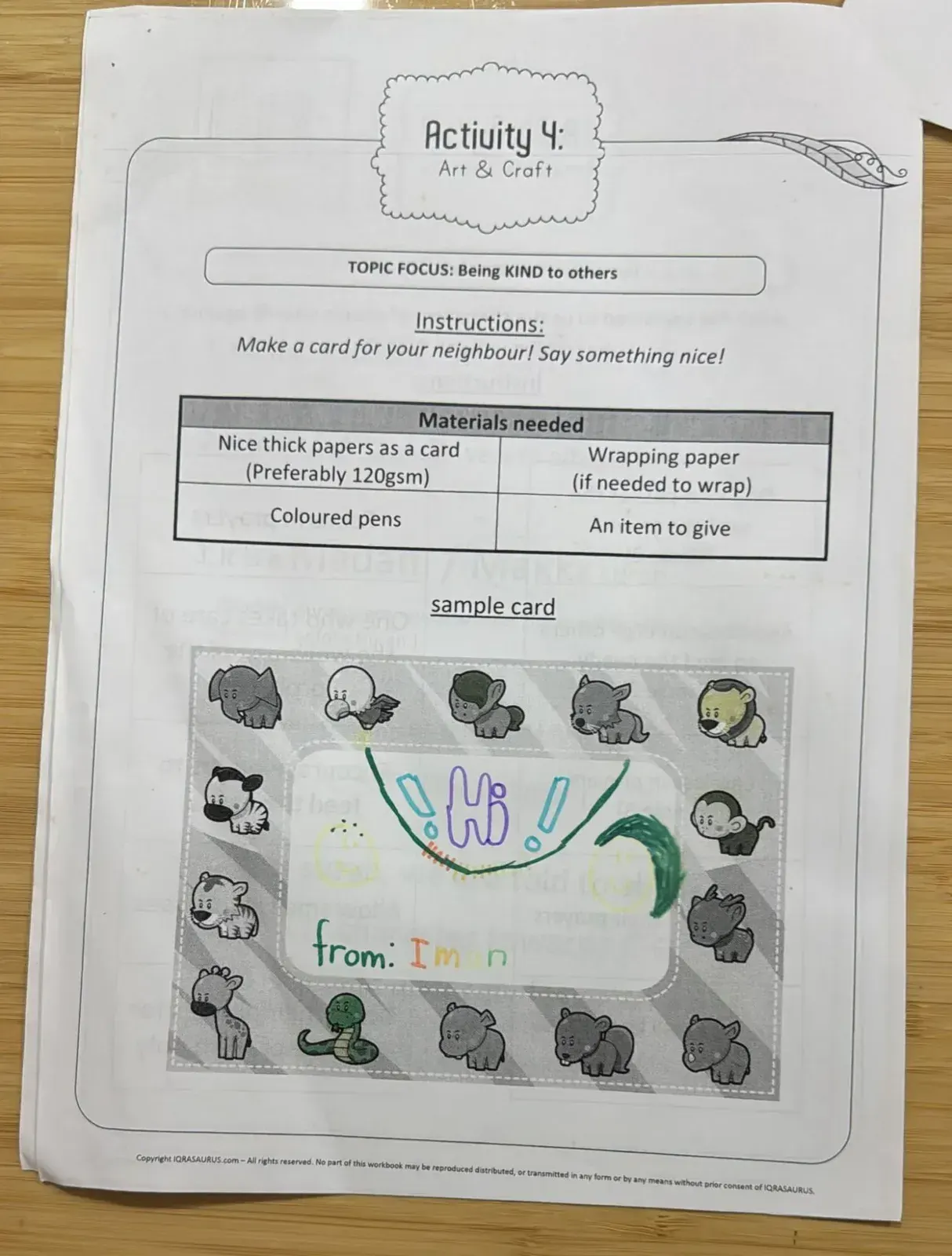 Hilwaa's kindness card: "Hi!" in coloured letters, signed "from: Iman"