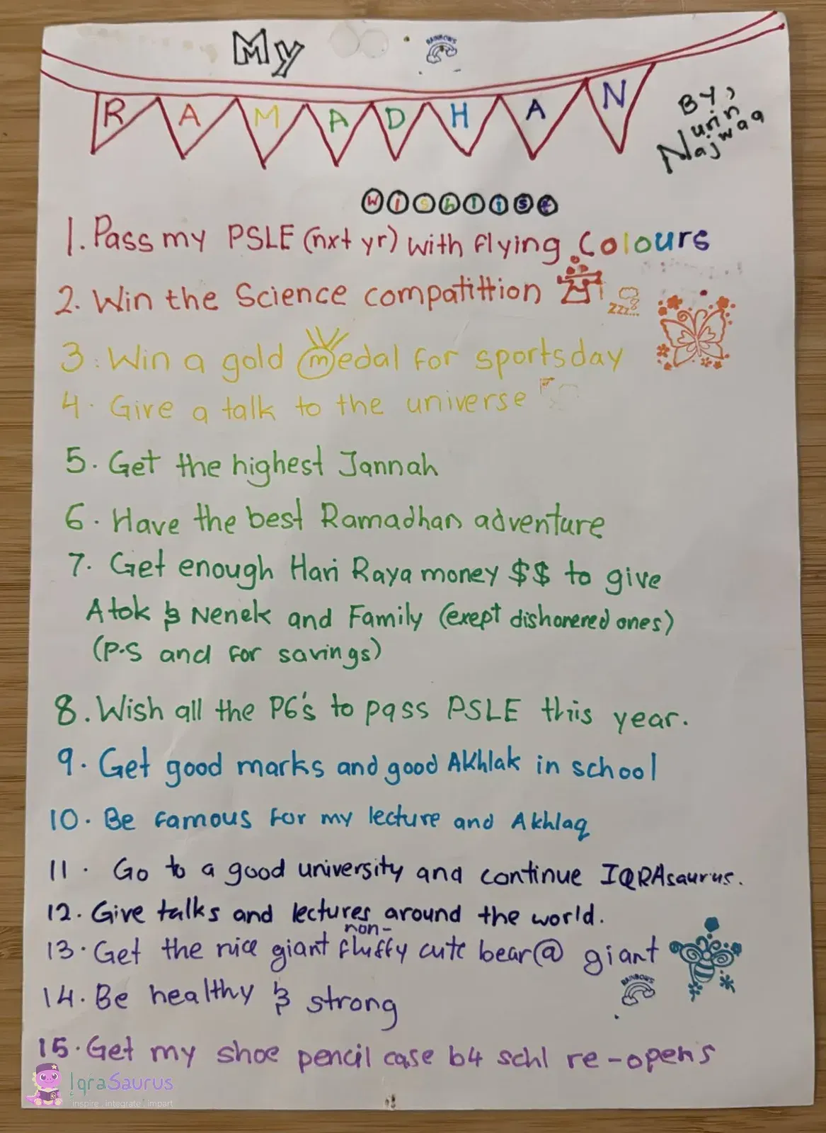 Nurin's hand-written Ramadhan wishlist under a row of bunting, each line in a different colour